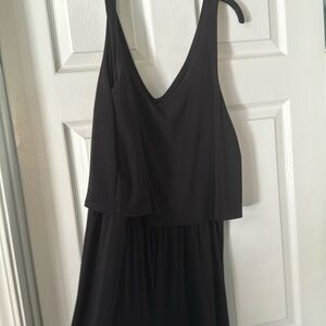 Woman’s black strap pant romper.